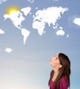 girl looking at world clouds and sun on blue sky Royalty Free Stock Photo