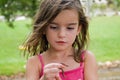 Girl Looking at a Worm Royalty Free Stock Photo