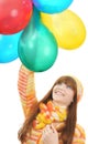 Girl looks admiringly at the balloons