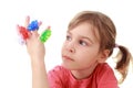 Girl looks at flashlights which are on fingers Royalty Free Stock Photo