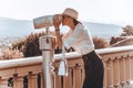 Girl looks at the panorama of Florence through a binoscope. The concept of tourism, travel Royalty Free Stock Photo