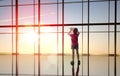 Girl looks at a plane Royalty Free Stock Photo