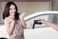 Girl looks shocked when get a new car Royalty Free Stock Photo