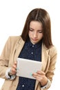 Girl looks in the tablet