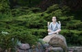 Girl in lotus position