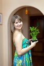 Girl with lucky bamboo Royalty Free Stock Photo