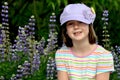 Girl in Lupin field Royalty Free Stock Photo