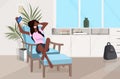 Girl lying on armchair african american woman using smartphone taking selfie photo modern living room interior flat full