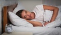 Girl Lying In Bed Suffering From Sleep Disorder At Home Royalty Free Stock Photo