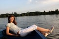 Girl lying on a boat