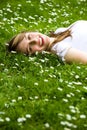 Girl lying on the grass Royalty Free Stock Photo