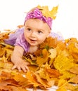 Girl lying on yellow leaves Royalty Free Stock Photo