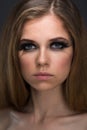 Bright cosmetics on young women and black lips Royalty Free Stock Photo