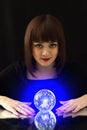 Girl and a magic ball Royalty Free Stock Photo