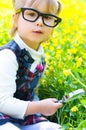 Girl with magnifying glass Royalty Free Stock Photo
