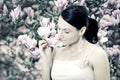 Girl and Magnolia flowers Royalty Free Stock Photo