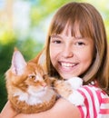 Girl with Maine Coon Royalty Free Stock Photo