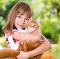 Girl with Maine Coon Royalty Free Stock Photo