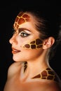 Girl with make-up giraffe