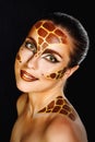 Girl with make-up giraffe