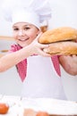 Girl making bread Royalty Free Stock Photo