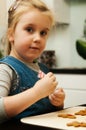 Girl making gingerbread cookies for Christmas Royalty Free Stock Photo