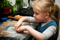 Girl making gingerbread cookies for Christmas Royalty Free Stock Photo