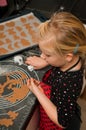 Girl making gingerbread cookies