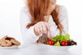 Girl making healthy diet choices Royalty Free Stock Photo