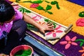 Girl making Holy Week processional carpet, Antigua, Guatemala