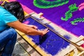 Girl making Lent processional carpet, Antigua, Guatemala