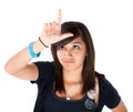 Girl Making the Loser Sign on her Forehead