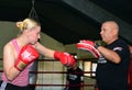 GIRL IN MARTIAL ARTS TRAINING SESSION Royalty Free Stock Photo