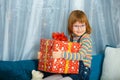 Girl Masha holding a box with a gift