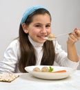 Girl matzo ball soup Royalty Free Stock Photo