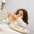 Girl matzo ball soup Royalty Free Stock Photo