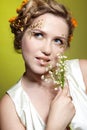 Girl with may lily flowers Royalty Free Stock Photo