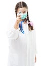 Girl in medical overall examine eyes