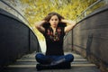 Girl Meditating on Bridge Royalty Free Stock Photo