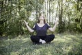 Girl meditating nature Royalty Free Stock Photo