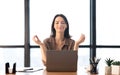 Girl meditating in office coping with stress Royalty Free Stock Photo