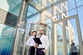 A girl with a man in construction white helmets and white shirts Royalty Free Stock Photo