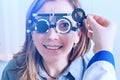 Girl in messbrille glasses in ophthalmology clinic Royalty Free Stock Photo