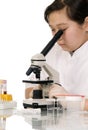 Girl with microscope. Royalty Free Stock Photo