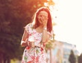 Girl with milk shake laughing Royalty Free Stock Photo