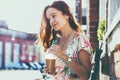 Girl with milk shake at street