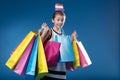 Girl mimics joyous, limitless high-society shopping