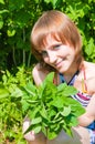 The girl with a mint bouquet Royalty Free Stock Photo