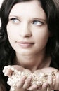 Girl model rope of pearls in the hands of Royalty Free Stock Photo