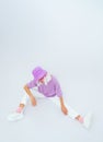 Girl Model in trendy summer look and  accessories posing in white studio.  Bucket hat. Street style. Urban Royalty Free Stock Photo